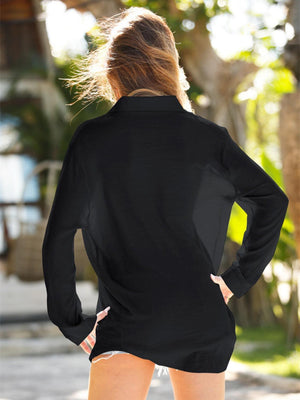 a woman in a black shirt and white shorts