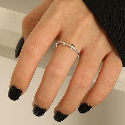 a woman's hand with a ring on it