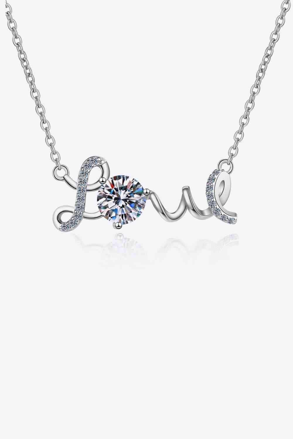 a necklace with the word love written on it