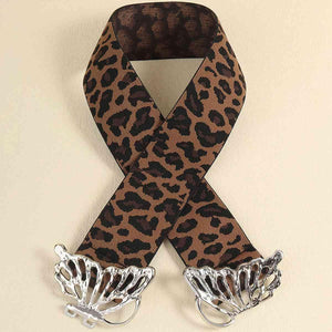 a brown and black ribbon with a leopard print design