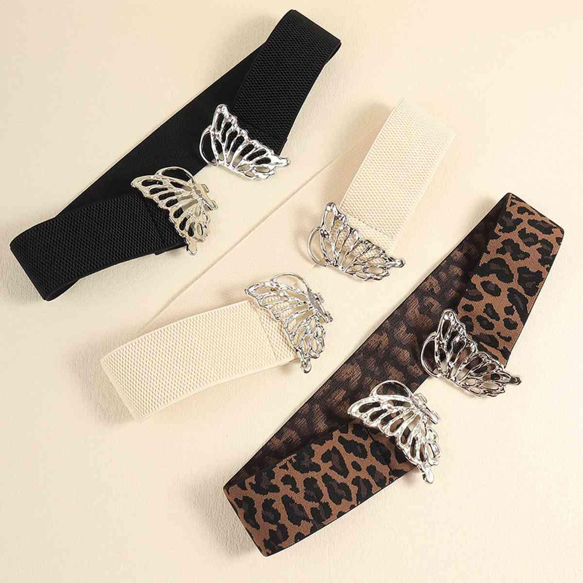 three pieces of animal print and metal hair clips