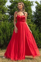 a woman in a red dress posing for a picture