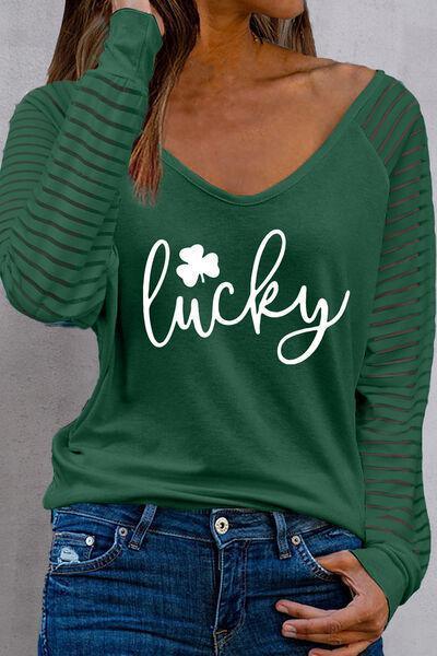 a woman wearing a green shirt that says lucky