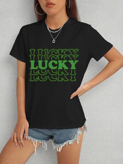 a woman wearing a black lucky t - shirt