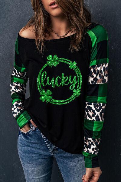 a woman wearing a black and green shirt with the word lucky printed on it