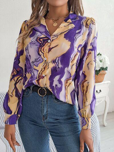 a woman wearing a purple shirt and jeans