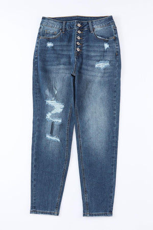 a pair of blue jeans with holes on them