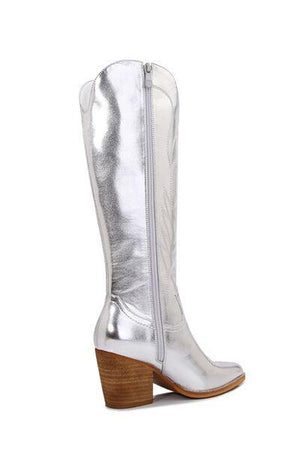 a pair of silver boots on a white background