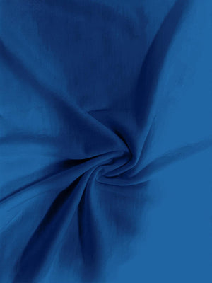 a blue background with a very large amount of fabric