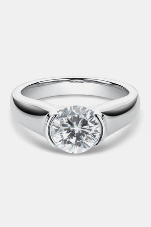 a white gold engagement ring with a round brilliant diamond