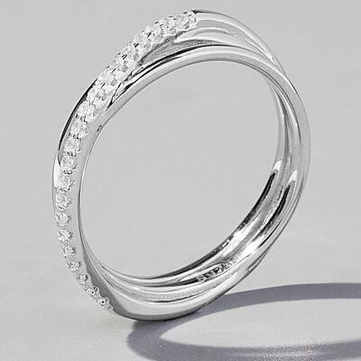 a white gold ring with three rows of diamonds