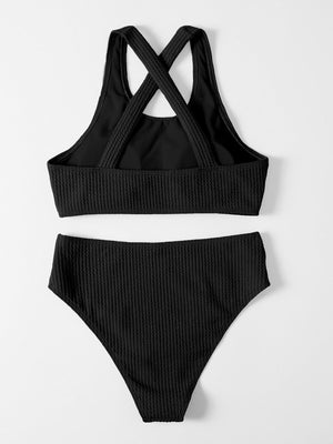 a black bikini top and bottom with straps