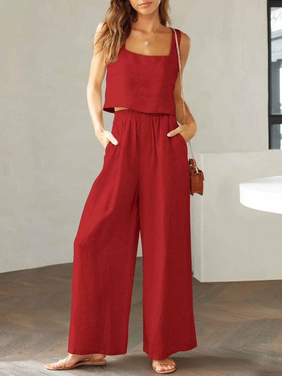 a woman in a red top and wide legged pants