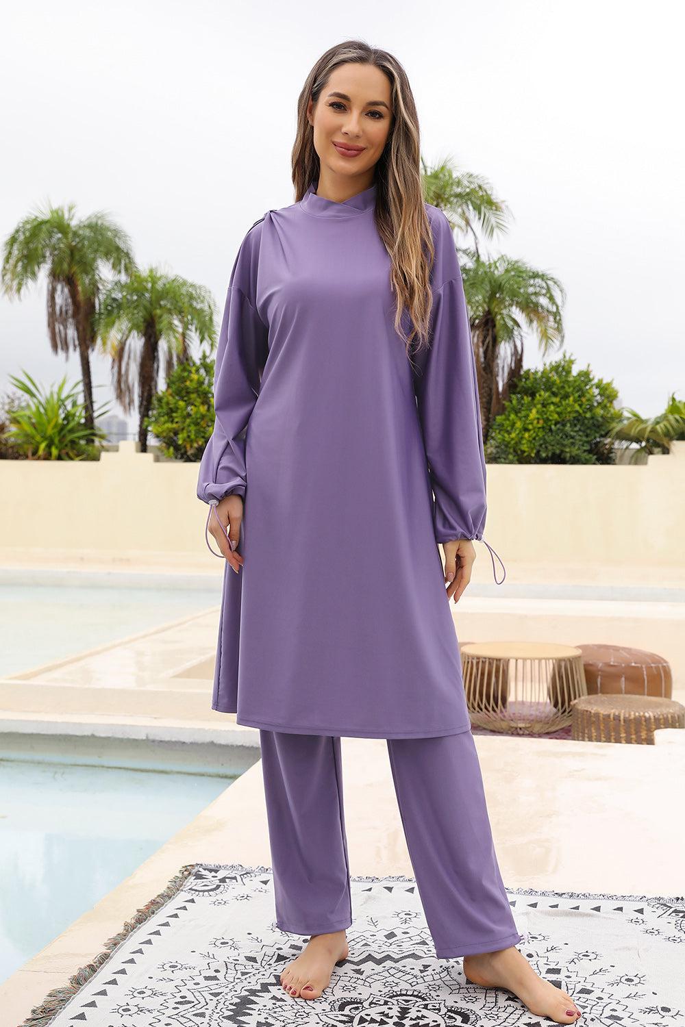 a woman standing on a rug in front of a pool