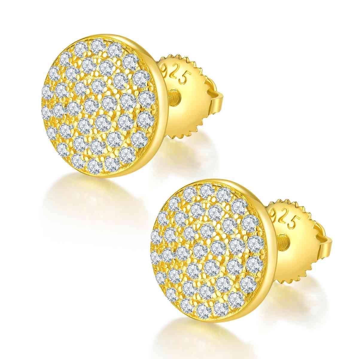 a pair of yellow gold earrings with white diamonds