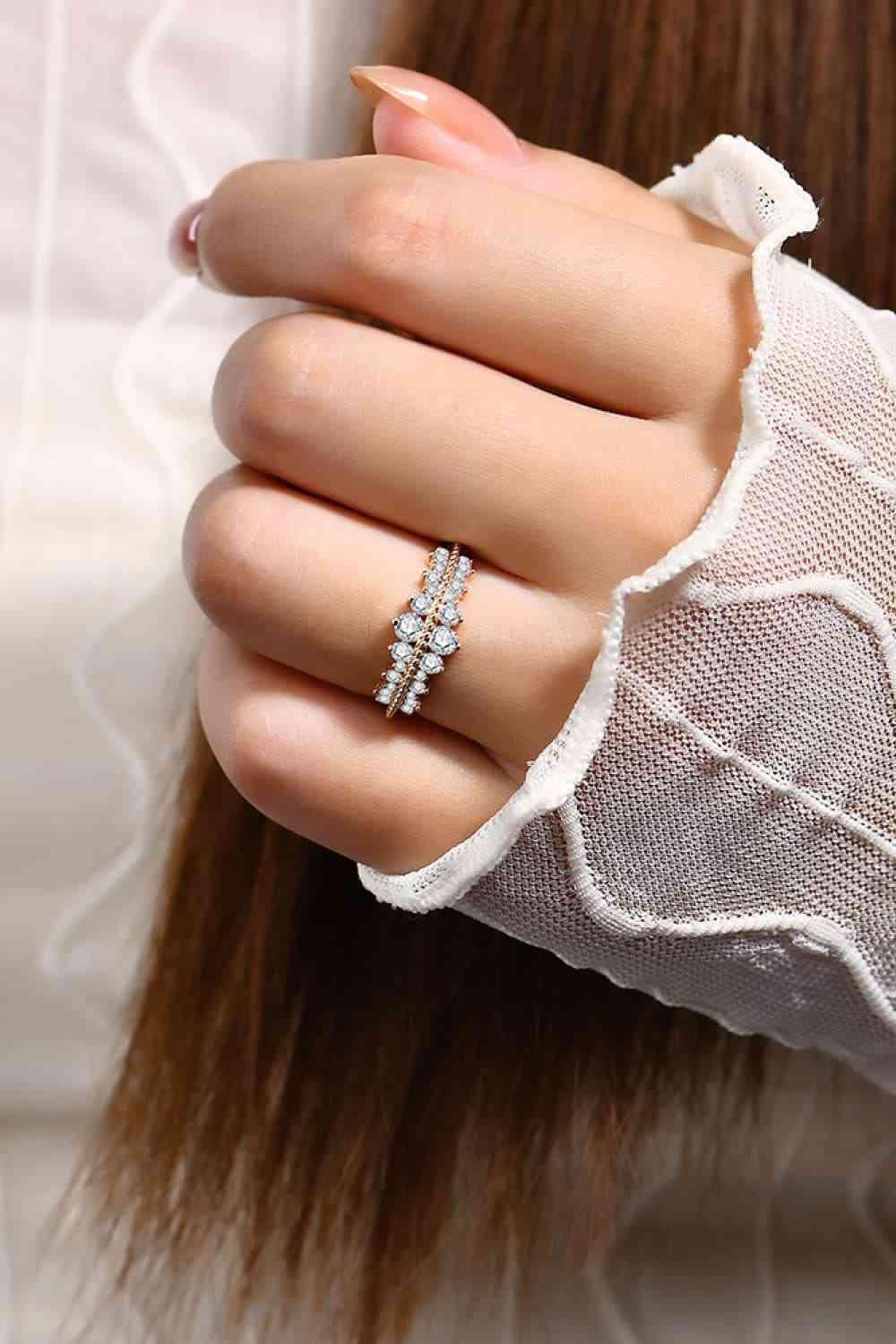 a woman's hand with a ring on it