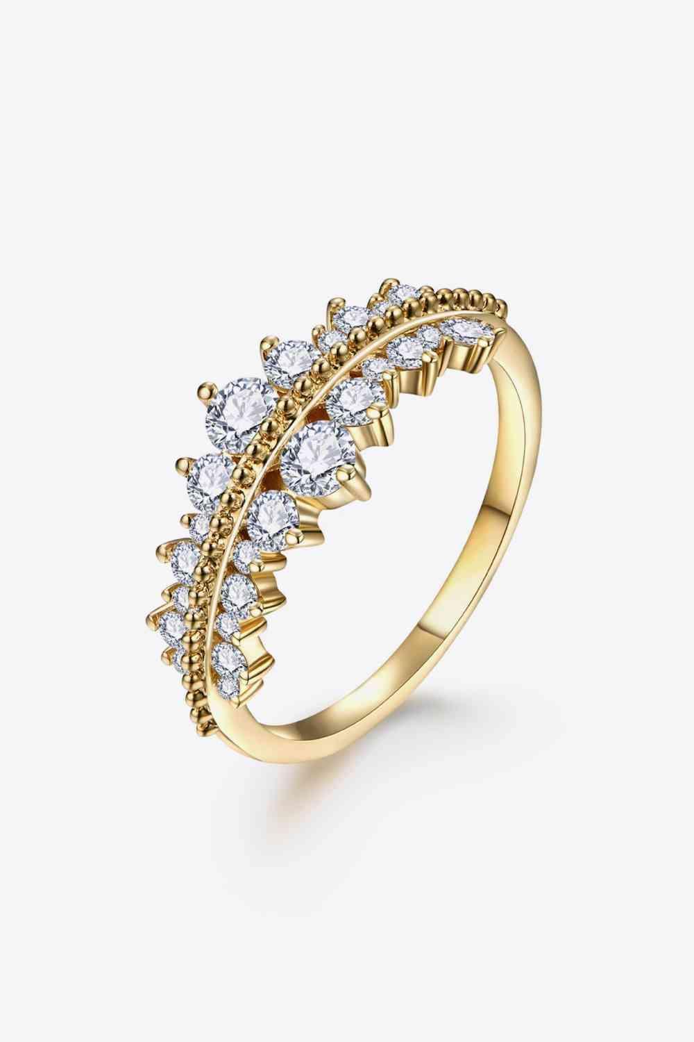 a yellow gold ring with a cluster of diamonds