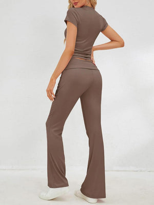 a woman in a brown top and pants