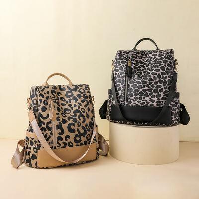 a leopard print bag and a leopard print backpack