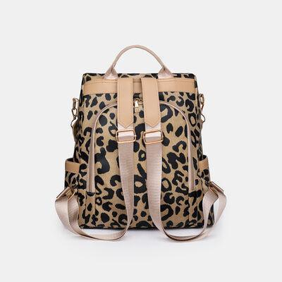 a leopard print backpack on a white background