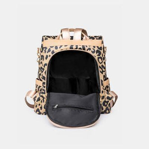 a leopard print backpack on a white background