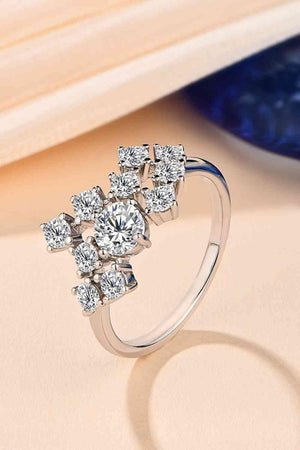 a white gold ring with a cluster of diamonds