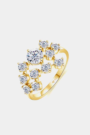 a yellow gold ring with diamonds on it