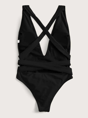 a black one piece swimsuit with cross straps
