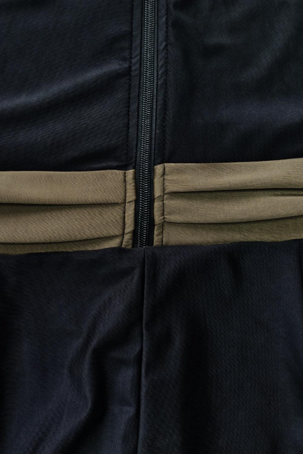 a close up of a person's pants with a belt