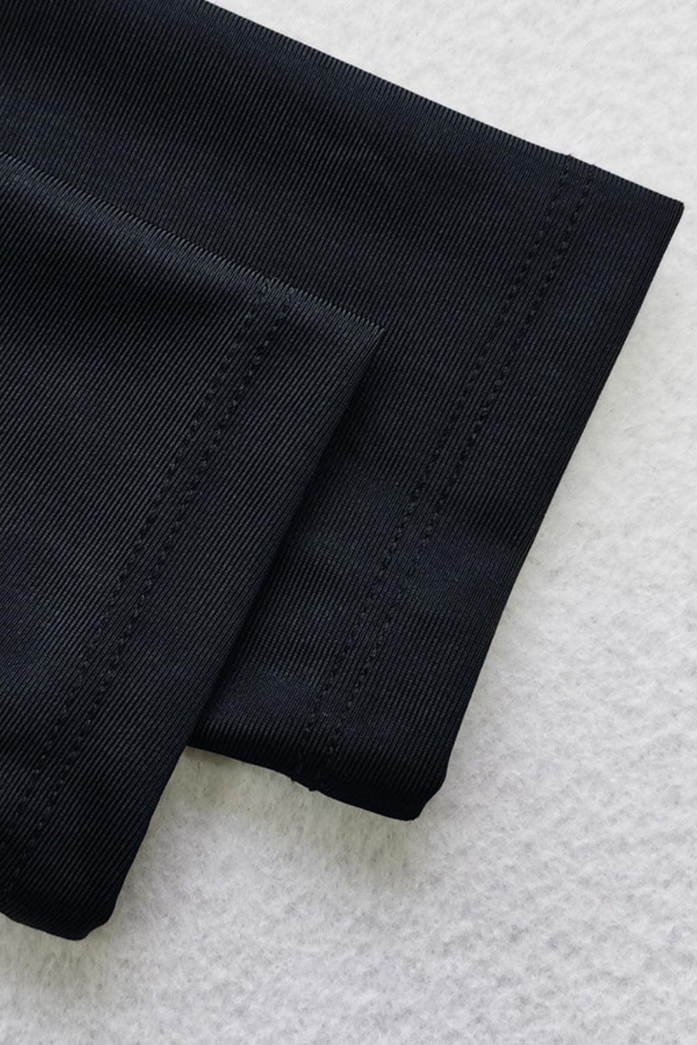 a close up of a pair of black pants