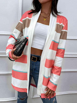 a woman standing in front of a garage door holding a purse