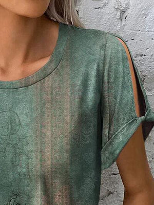 a close up of a woman wearing a green top
