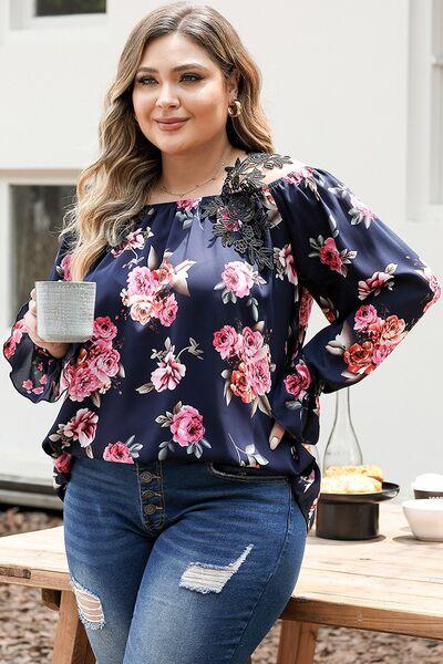 a woman in ripped jeans and a floral top