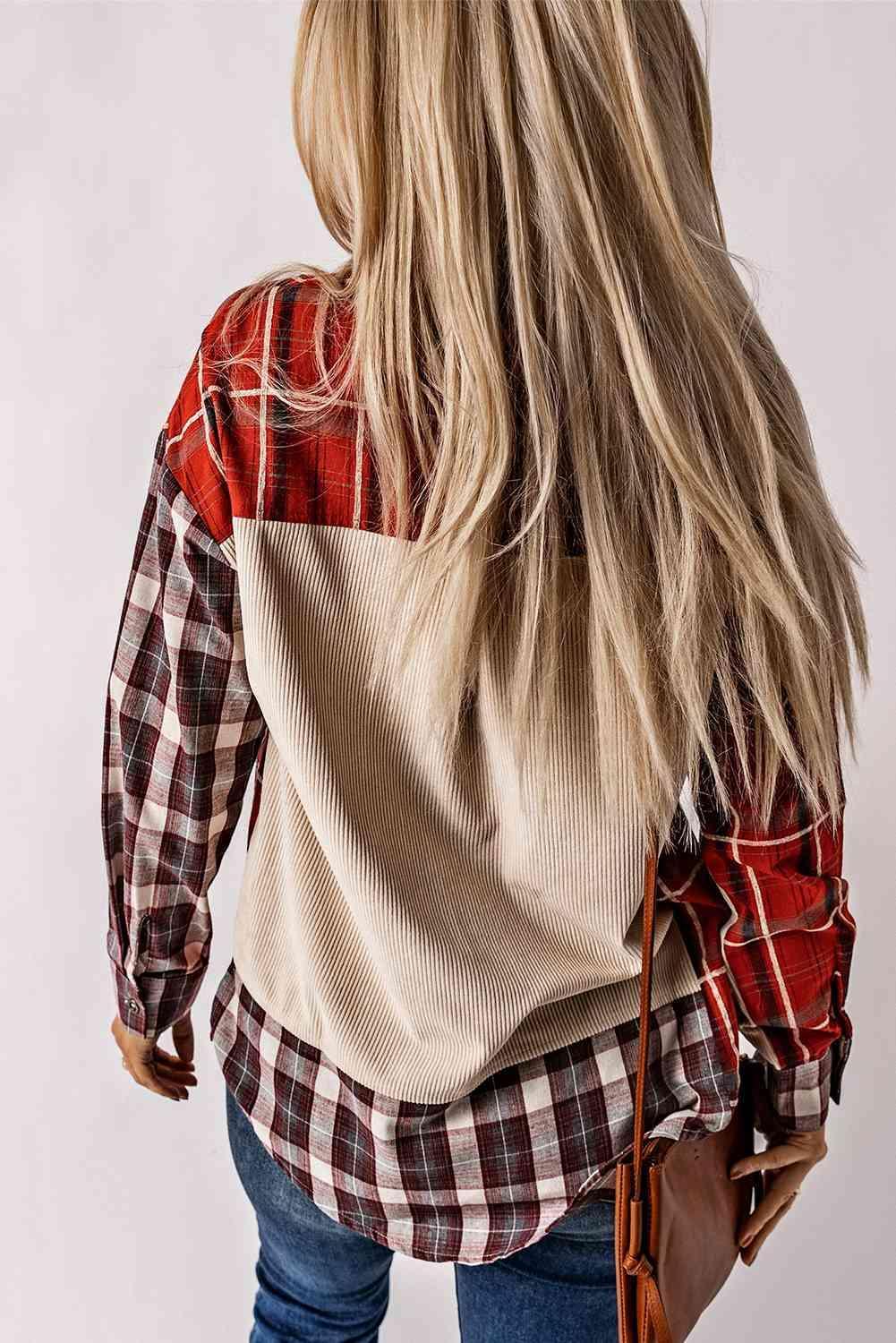 a woman wearing a plaid shirt and jeans