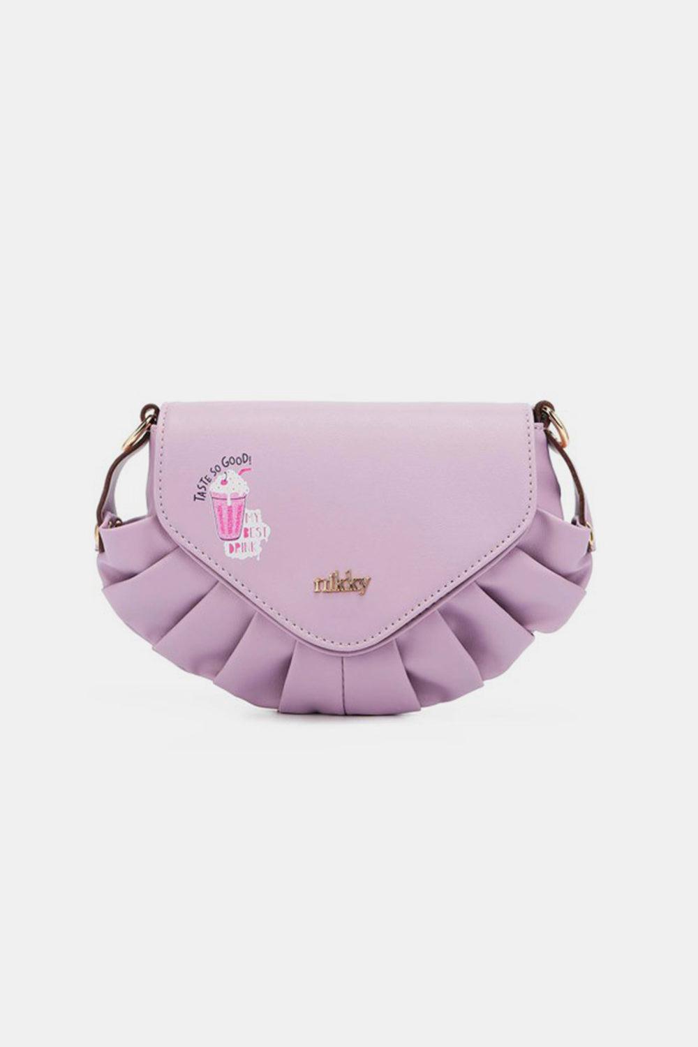 a purple purse with a pink bow on the front