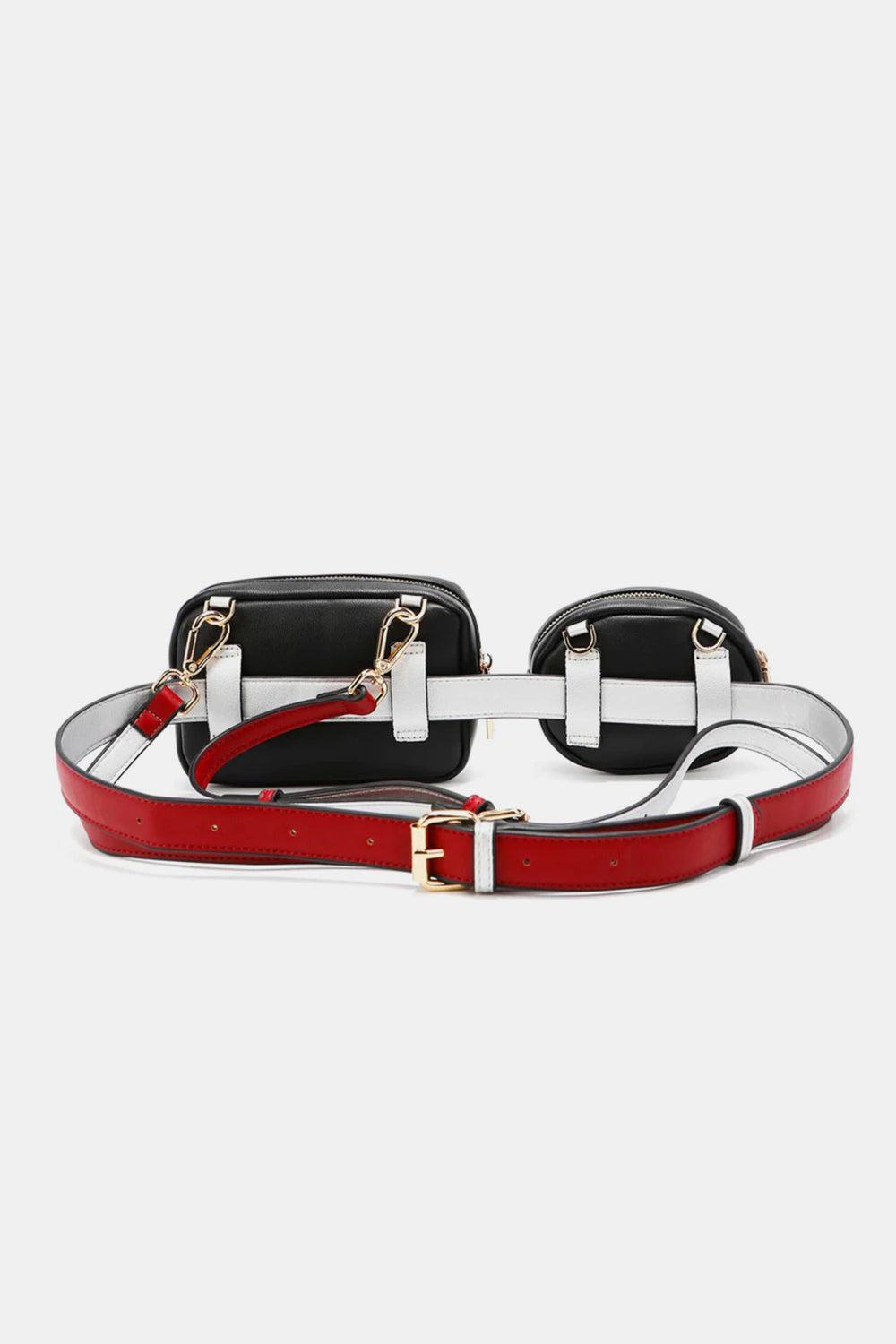 a black, white, and red belted bag