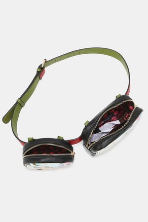 a small black purse with a green strap