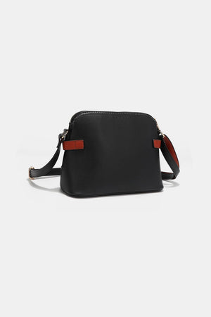 a black cross body bag on a white background