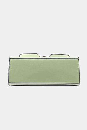 a pair of glasses sitting on top of a green case