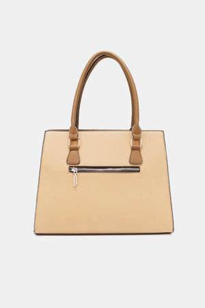 a beige handbag on a white background