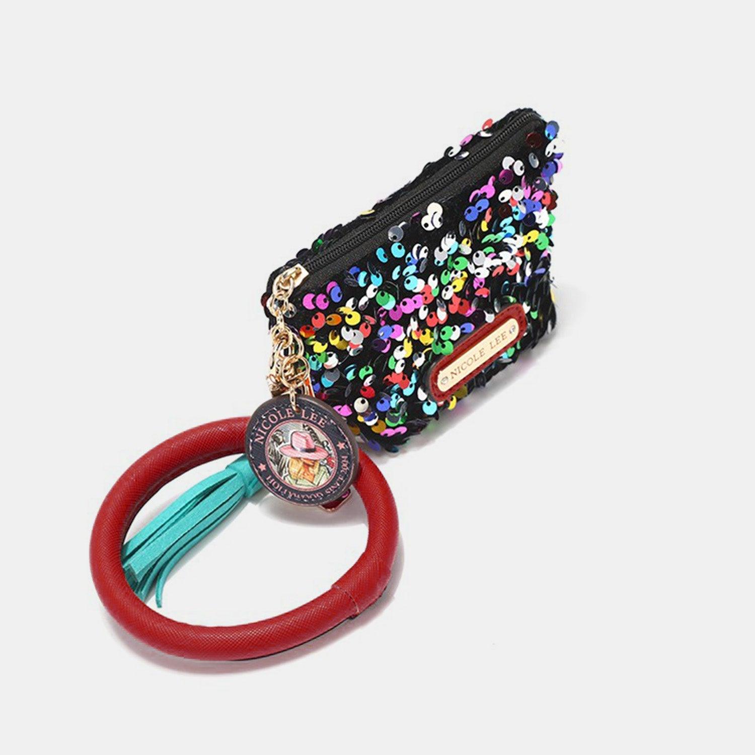 a small purse with a ring on it