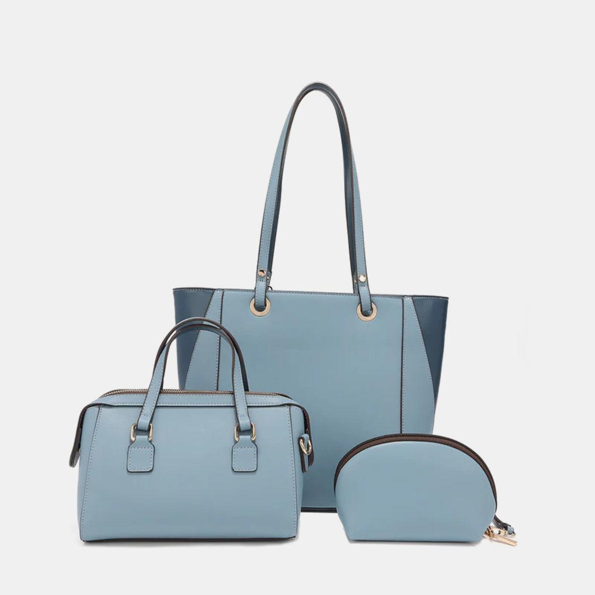 three pieces of blue leather bags