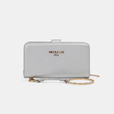 a white purse with a gold handle