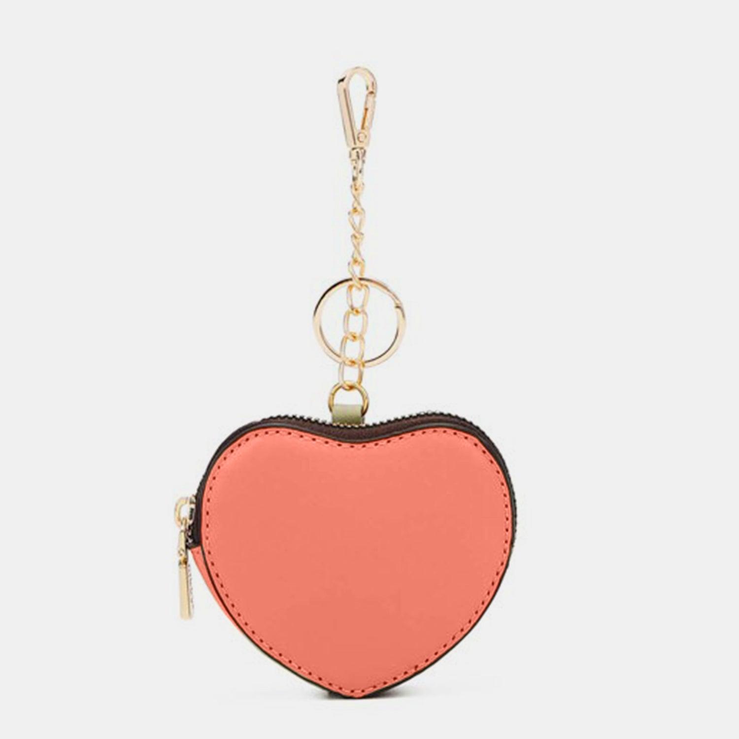 a heart shaped keychain with a chain hanging from it