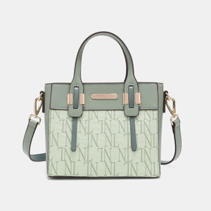 a green and white handbag on a white background