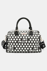 a black and white polka dot print handbag