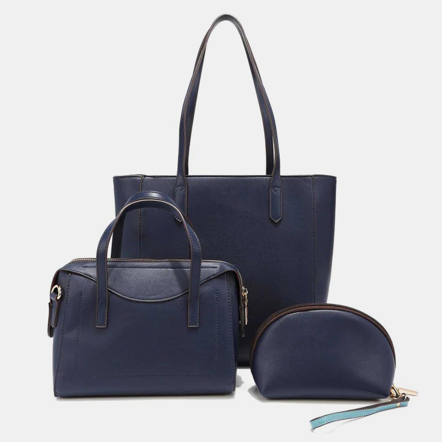 three pieces of blue leather handbags