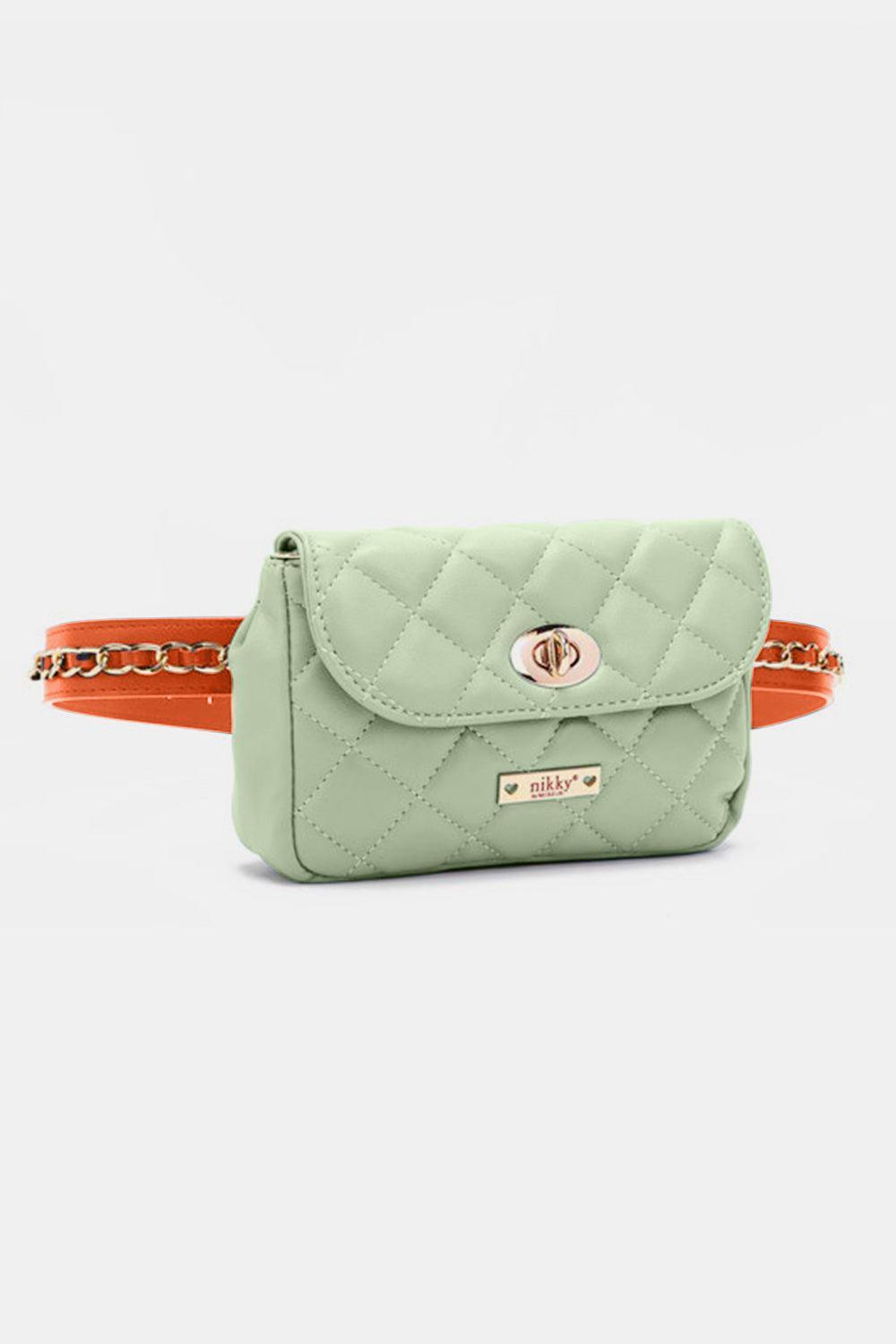 a small green purse with a chain strap