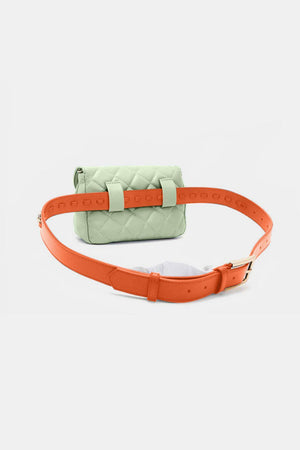 a green and orange belted bag on a white background