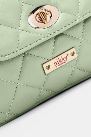 a mint green purse with a gold buckle